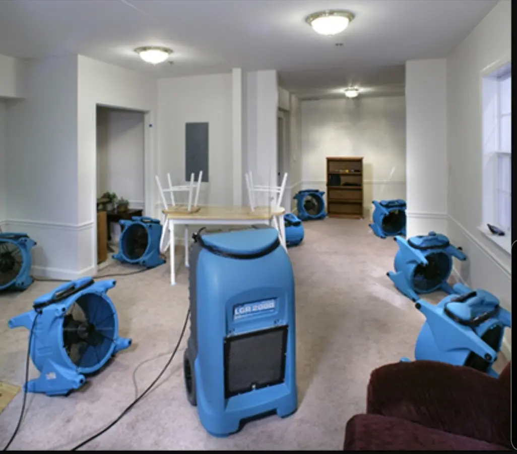 Air movers and dehumidifier setup for Water Damage Restoration in Newcastle